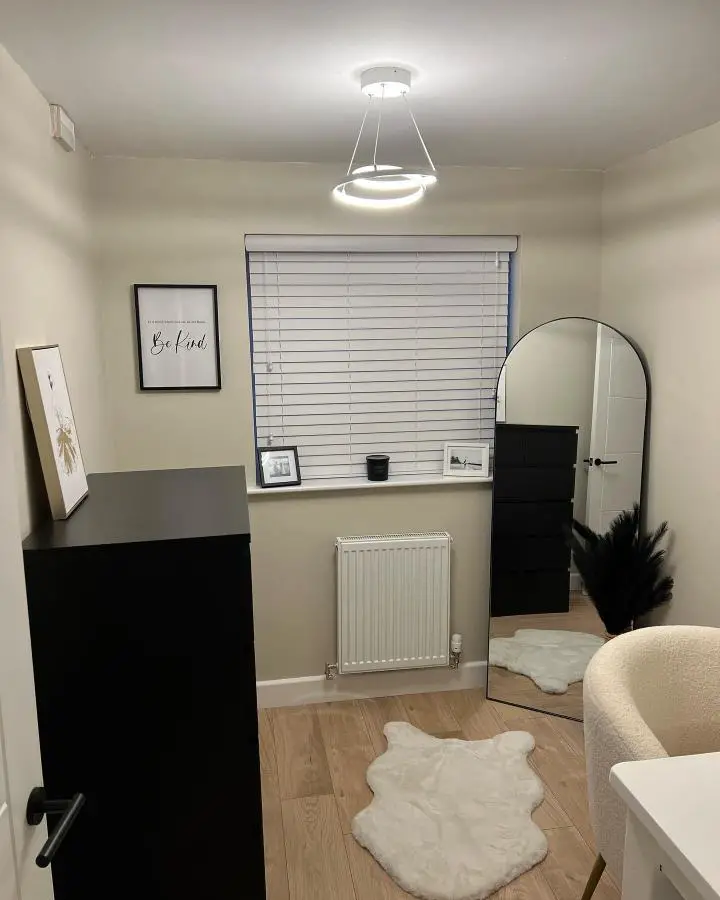 Modern arched mirror dressing area from @our_new_beginning9. Perfect small dressing room ideas with neutral tones and cozy textures.