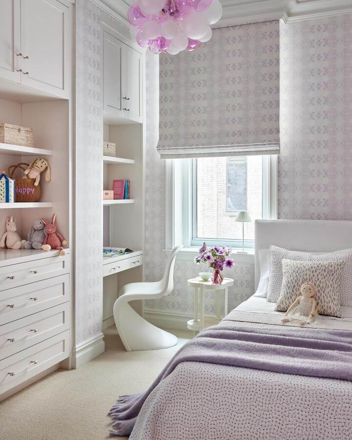 Soft lavender bedroom ideas featuring knitted throws and patterned lavender wallpaper by @deborahpianininteriors with cozy textures and gentle lighting.