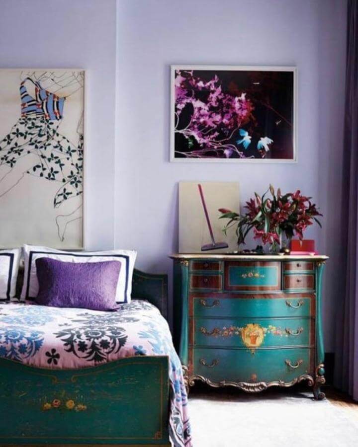 Soft lavender bedroom ideas with vintage painted dresser and patterned bedding from @enisekottas.ave64 featuring floral artwork and cozy accents.