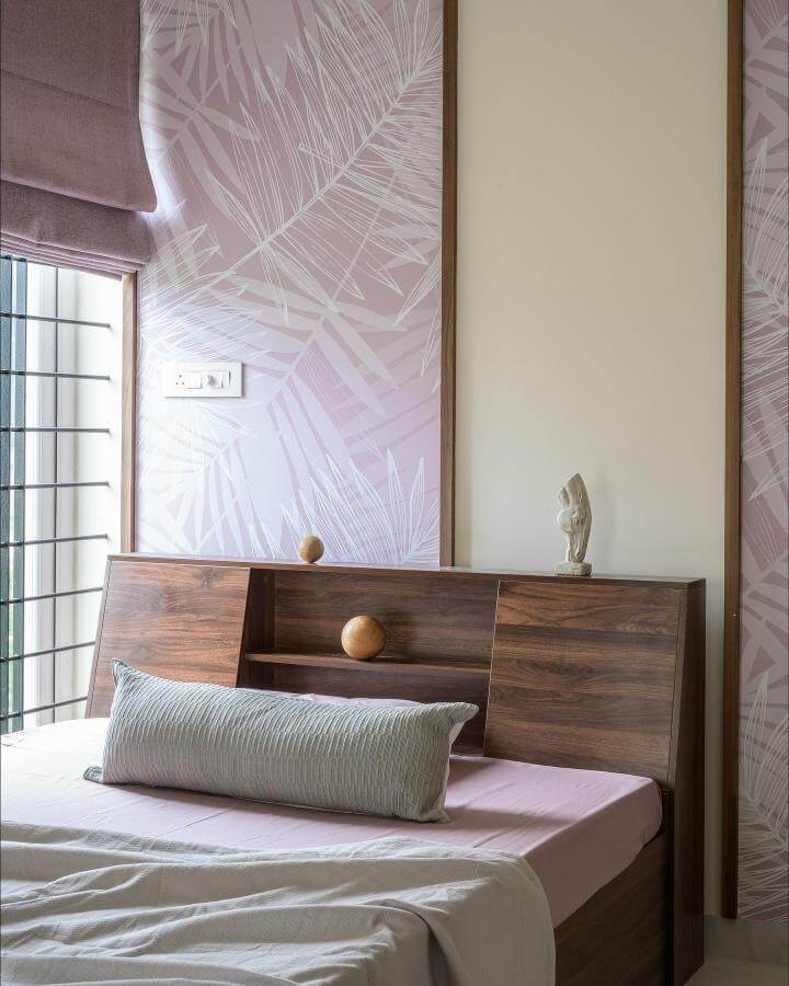 Soft lavender leaf print wallpaper and walnut headboard bedroom by @joisdesignhouse with calming natural light and minimalist decor.