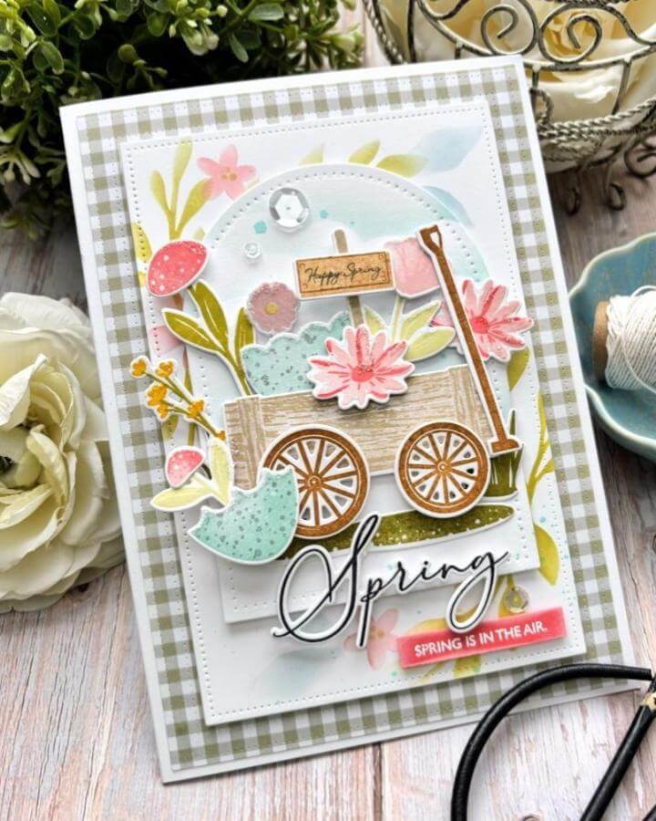 Soft pastel floral wagon card with gingham background from @papertreyink. Rustic spring crafts for adults with delicate details and layering.