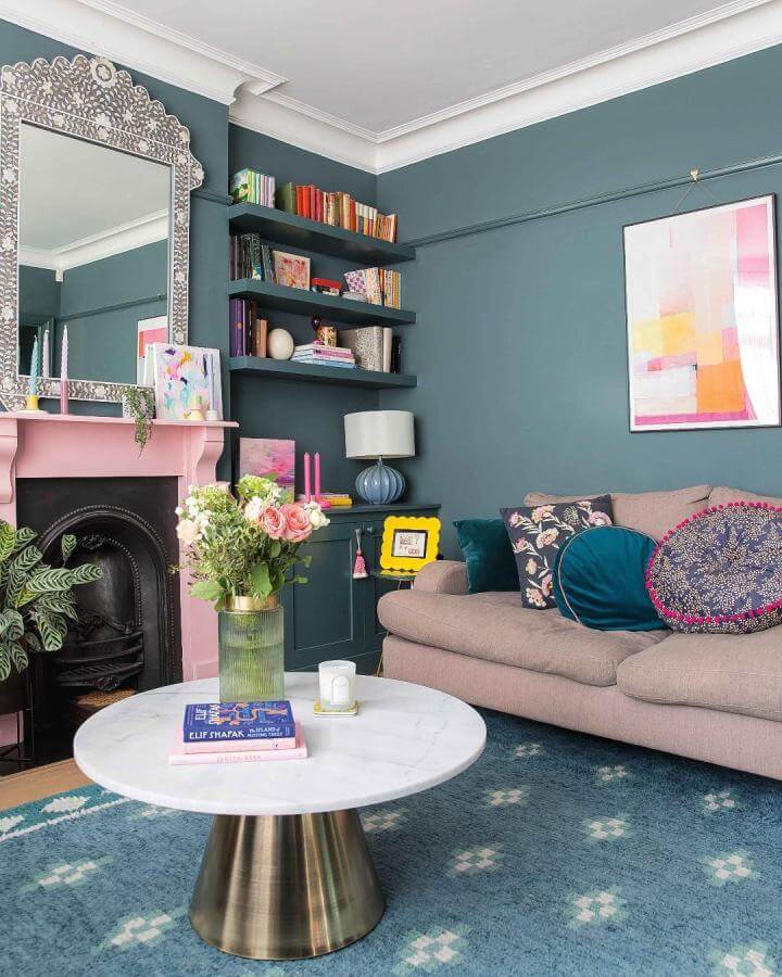 Pink Fireplace With Teal Walls And Soft Textiles In Cozy Stylish Living Room From @homestylemaguk Bright And Inviting Decor