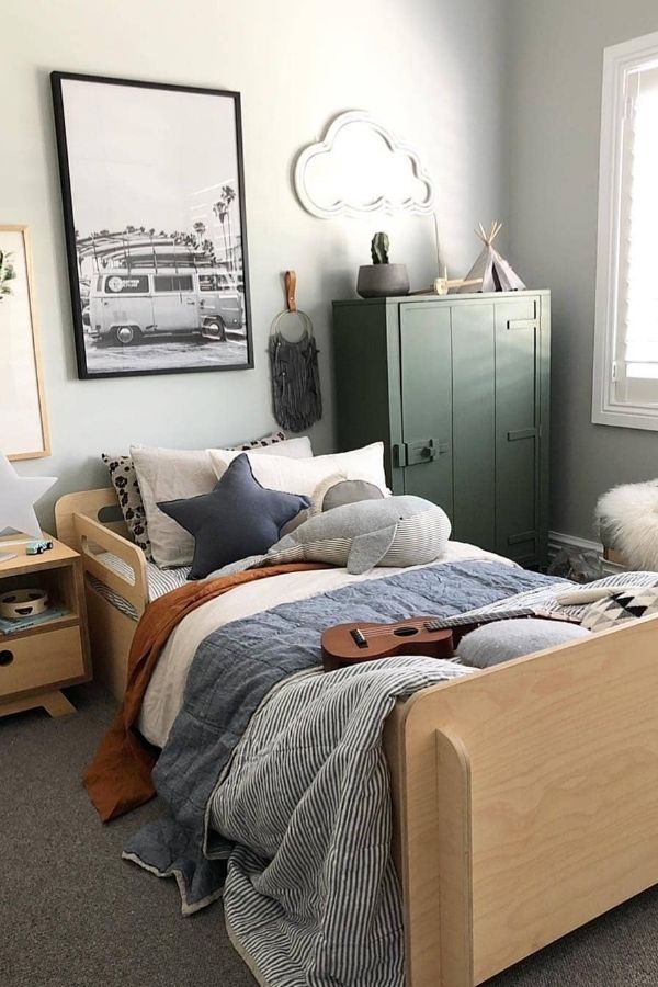 Boho-inspired bedroom featuring earthy tones, eclectic decor, and plants.