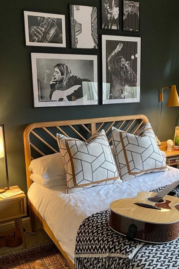 Cozy bedroom featuring vintage records, guitar, piano, and comfy bed.