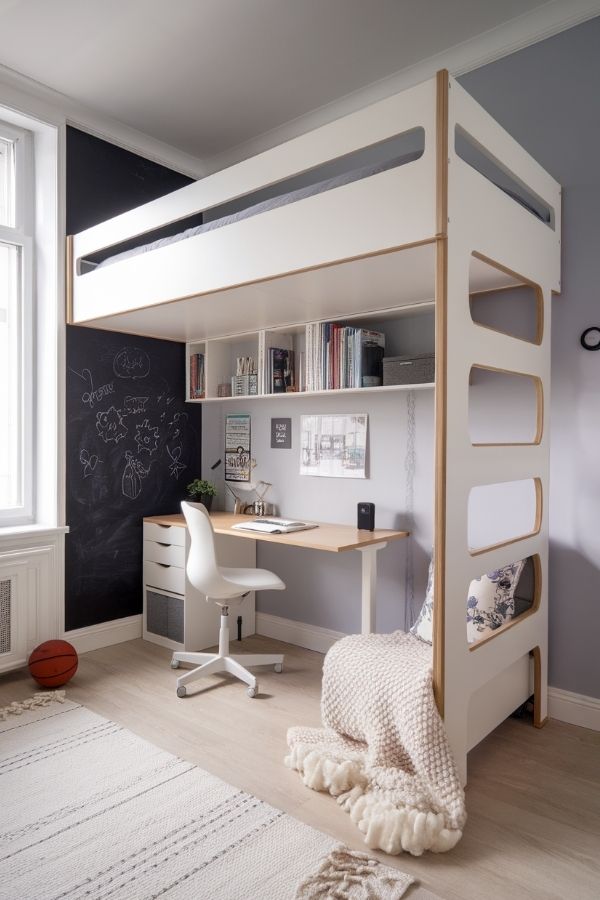 Minimalist loft bed featuring integrated study area with sleek design.