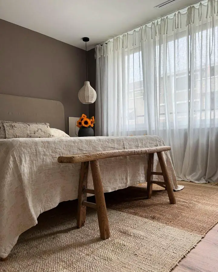 Raw wooden bench bedroom from @ourwabisabihome showcasing authentic wabi sabi bedroom ideas with natural textures.