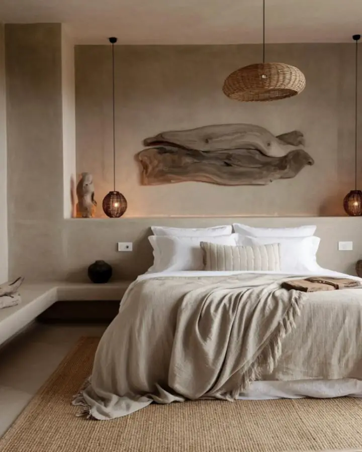 Weathered driftwood wall art from bedroom featuring natural wood tones and organic shapes.