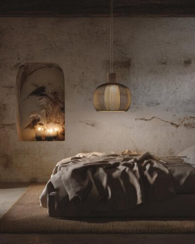 Weathered concrete bedroom walls showcasing natural cracks and stains perfect for wabi sabi bedroom ideas inspiration.