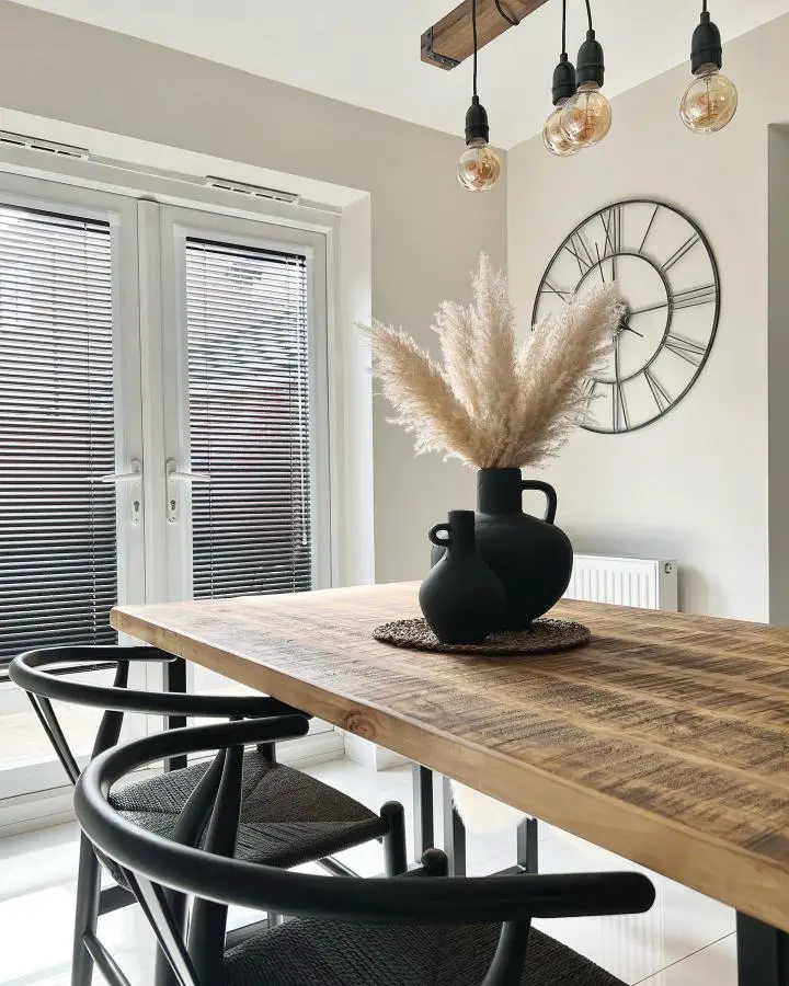 Reclaimed wood dining table from @home_at__no3. Natural grain patterns showcase authentic weathered character beautifully.