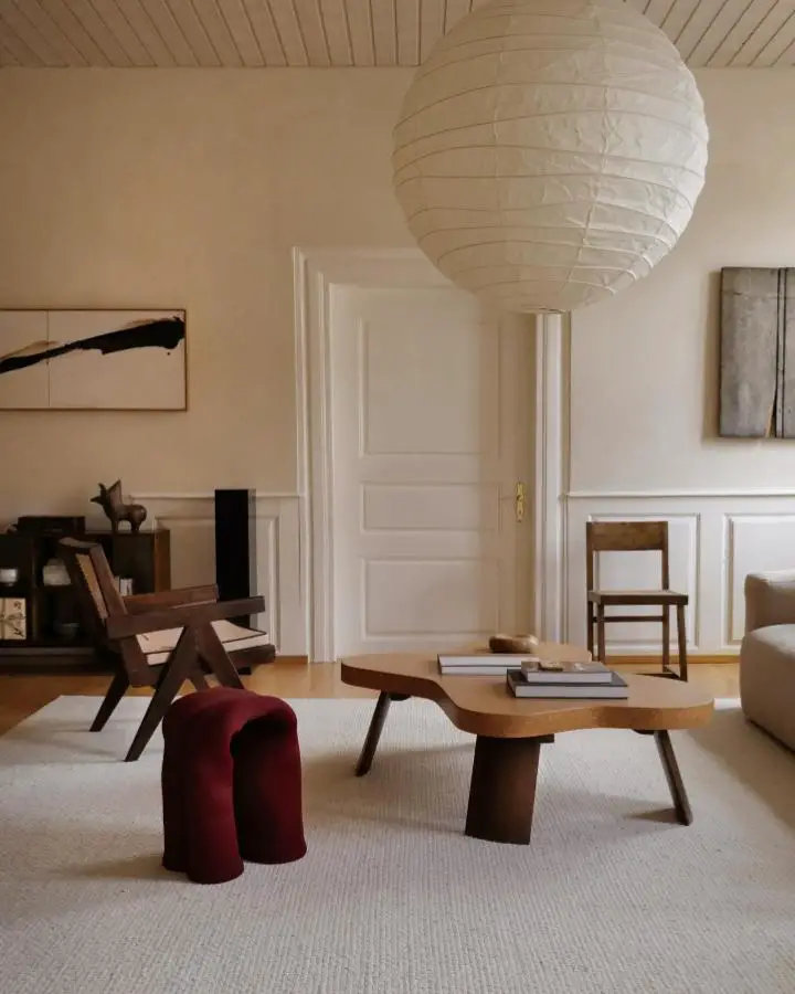 Oversized cream paper lantern living room from @aaroninteriors. Perfect example of wabi sabi living room ideas with natural textures.