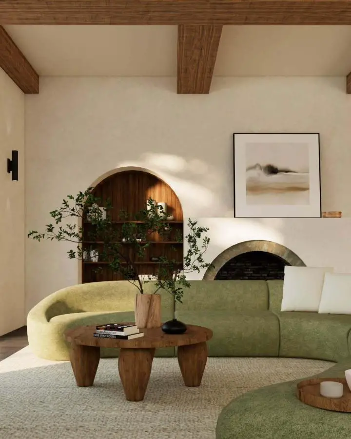 Curved sage green sofa and wooden coffee table from @kelcieweberrenderings showcasing wabi sabi living room ideas with organic shapes.