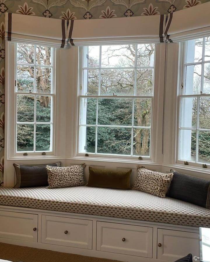Olive, spotted, and charcoal cushions on patterned window seat from @pucciupholstery. Cozy and stylish window seat ideas.