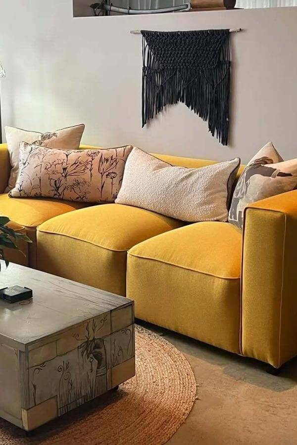 Vibrant yellow velvet sofa from @adelita_design brightens up the living area, embodying the ultimate yellow sofa living room inspiration.